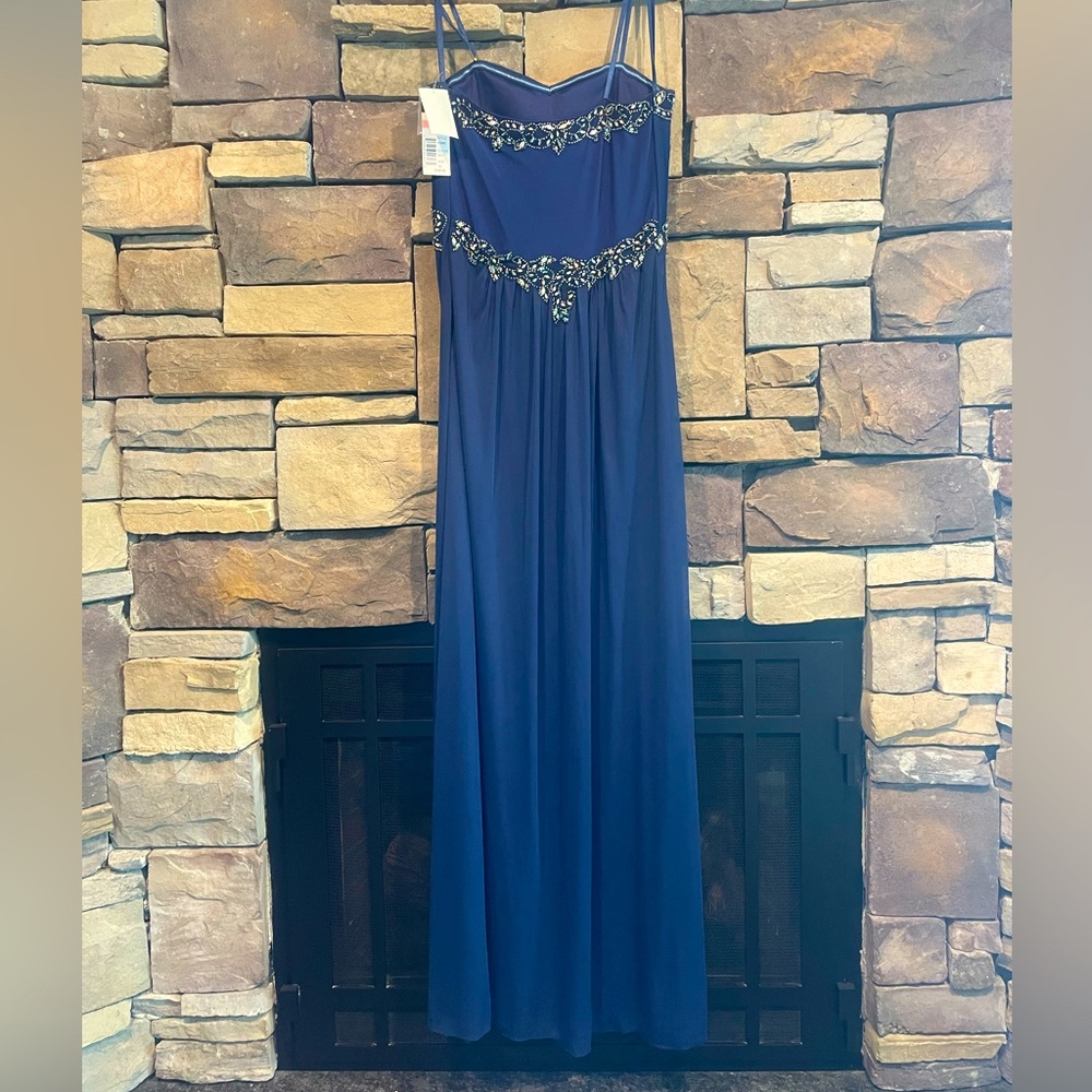 Size 10 Navy blue strapless that has never been worn and still has tags